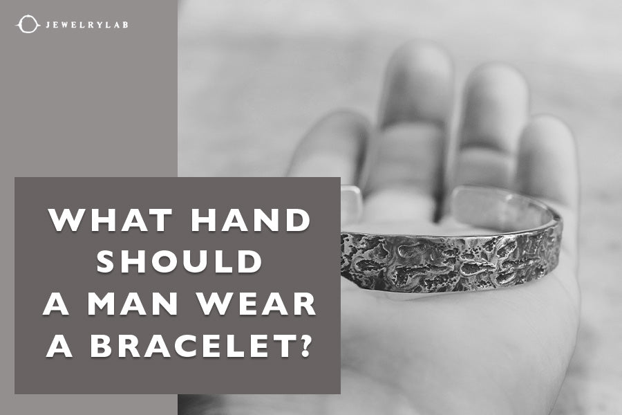 On which hand is a silver bracelet worn?