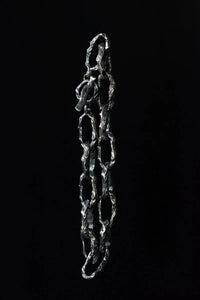 Aji XL sterling silver chunky chain necklace displayed against a black background, highlighting its textured and thick chain link design.