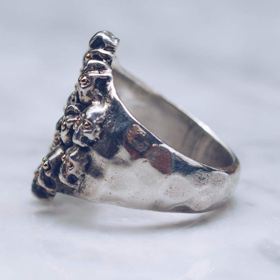 JIVE SKULLS RING | SILVER & GOLD EYES