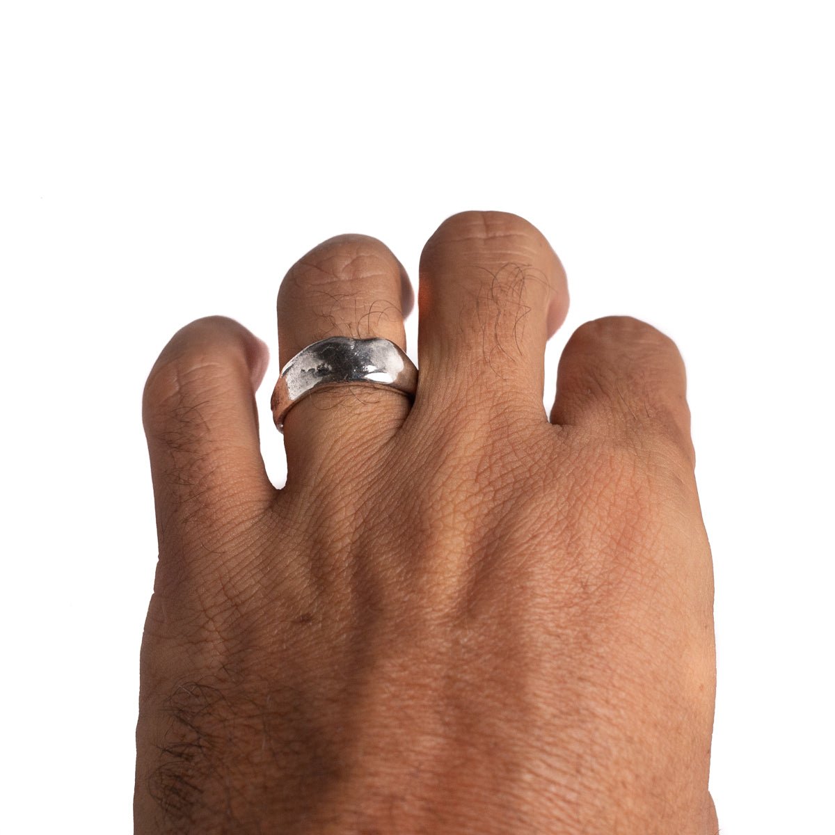 JewelryLab Medium Uja Ring in sterling silver with an irregular sculptural band worn on a hand